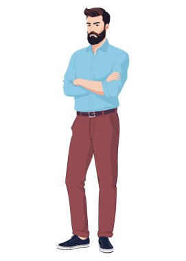 Mavi gömlekli ve kahverengi pantolonlu sakallı bir adam kollarını göğsünde kavuşturmuş duruyor.