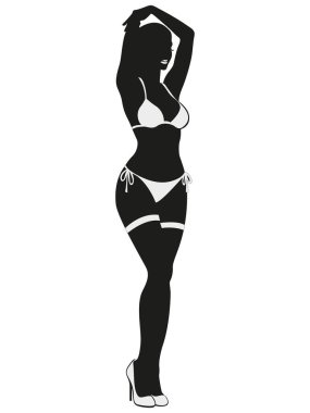 Şık bir yaz mayosu giymiş, kendine güveni ve zarafetiyle göz kamaştırıcı bir modelin parlak ve modern silueti.