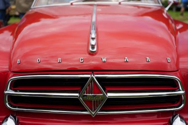 Iserlohn Gruermannscheide, NRW, Germany. 13th of July 2024.Close-up photo of oldtimer car front Borgward Isabella clipart