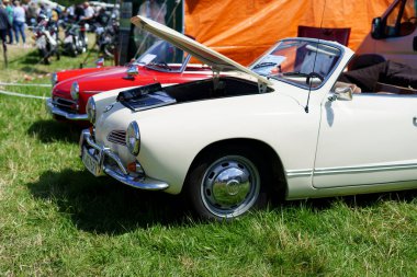 Iserlohn Gruermannscheide, NRW, Germany. 13th of July 2024. Old vintage Volkswagen Karmann-Ghia car outdoors in summer clipart