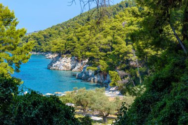 The famous turquoise pebble beach of Kastani where the famous Mamma Mia movie was filmed, located in Skopelos island, Sporades, Greece
