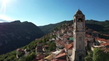 Aerial view of the historical village Dimitsana with the traditional houses and the famous clock tower in Arcadia, Peloponnese, Greece