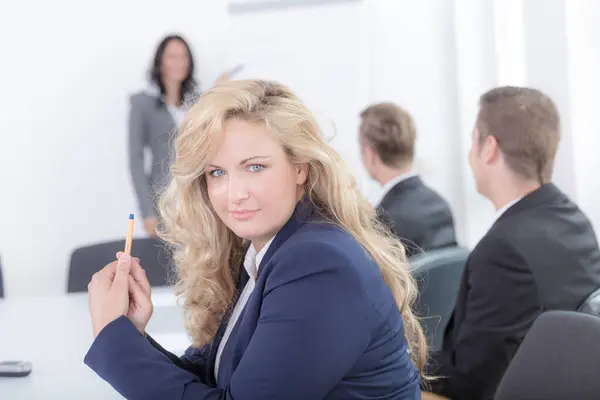 business woman in school room is happy to learn