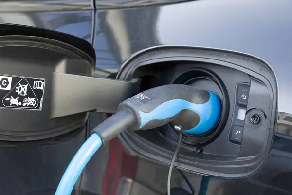 Close Charging Electrical Car Stock Photo