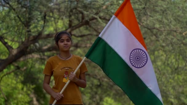 Cute Little Indian Girl Holding Waving Running Tricolour Hill Greenery — Stock Video