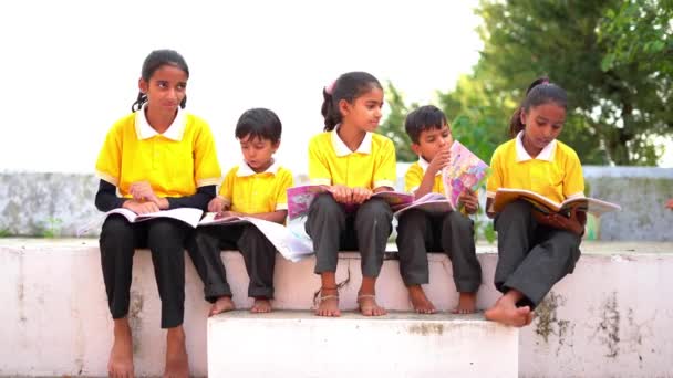 Group Children Sitting Bench Reading Book — Stock Video