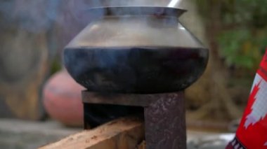 Making Millet Khichadi on Chulha(stove) - A traditional dish in Rajasthan.