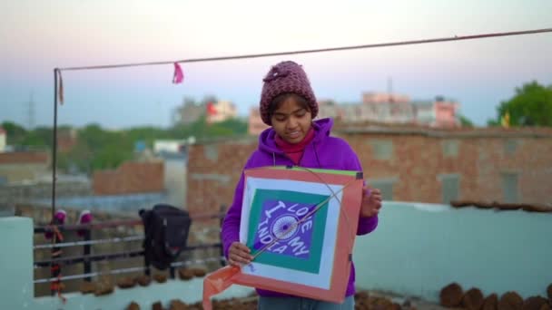 Young Girl Enjoying Kite Festival Roof Top Residence — Video Stock