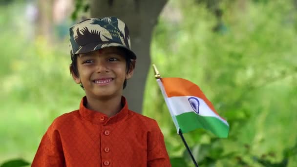 Little Boy Wearing Orange Kurta Pajama Holding Indian Flag Occasion — Stock Video