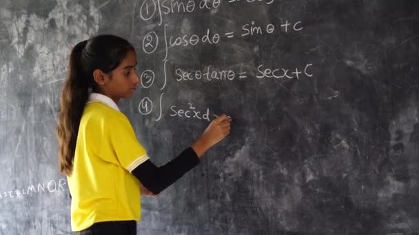 Happy Indian School Girl Child Standing Front Black Chalkboard Background — Stock Video