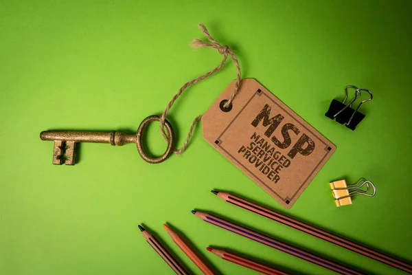 MSP, Managed Service Provider. Key with price tag on green background.