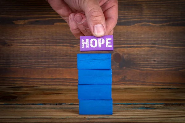 Hope Concept Kleurrijke Blokken Een Houten Textuur Achtergrond — Stockfoto