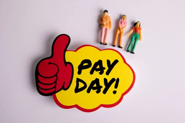 Pay Day Concept. Sticky note with text on a white background.