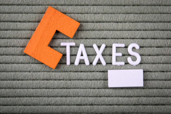 Taxes Concept Bílá Písmena Abecedy Zeleném Pozadí — Stock fotografie