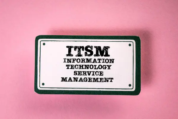 ITSM - Information Technology Service Management. Sticky note with text on a pink background.