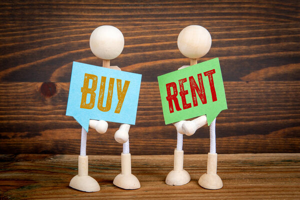Buy or Rent. Two speech bubbles and miniature people on a wooden texture background.