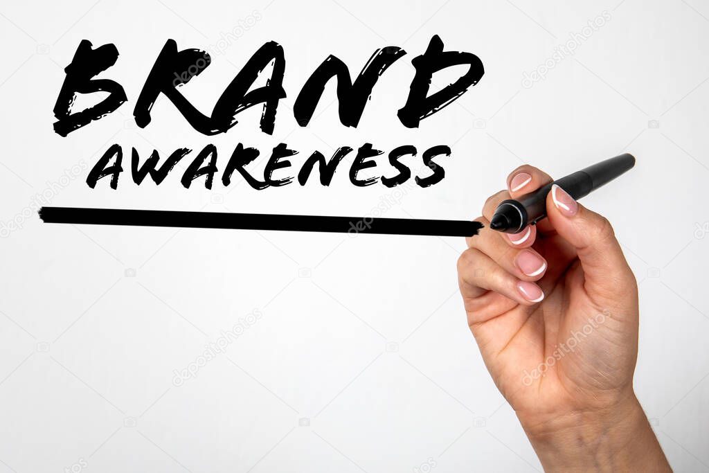 Brand Awareness Handwritten with Marker on Whiteboard. Marketing Concept.
