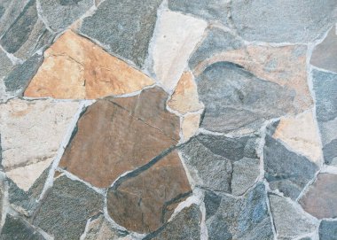 Desenli seramik. Arkaplan veya doku için soyut granit desenler. Karma gri ve kahverengimsi desenli seramik. Çeşitli ihtiyaçlar için soyut arkaplanlar