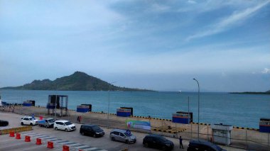 Background of the harbor pier. Bakauheni Port Lampung, Sumatra Island, connecting Merak Port, Java Island. Homecoming concept, Indonesian tourist destinations