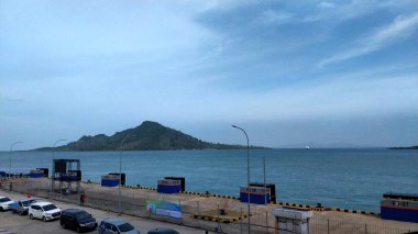 Background of the harbor pier. Bakauheni Port Lampung, Sumatra Island, connecting Merak Port, Java Island. Homecoming concept, Indonesian tourist destinations