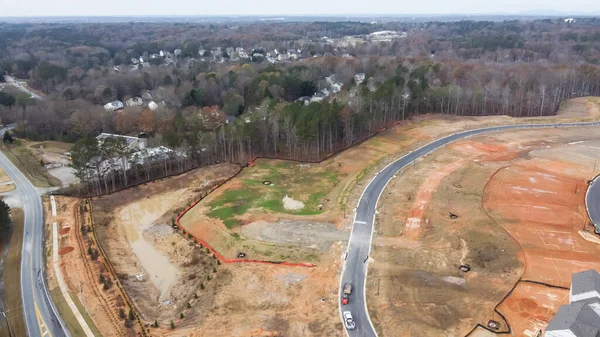 stock image New subdivision planning, residential street and lot size slope and shape, earthmoving work ready for new construction outside Atlanta, GA, USA. Suburban residential neighborhood expanding development