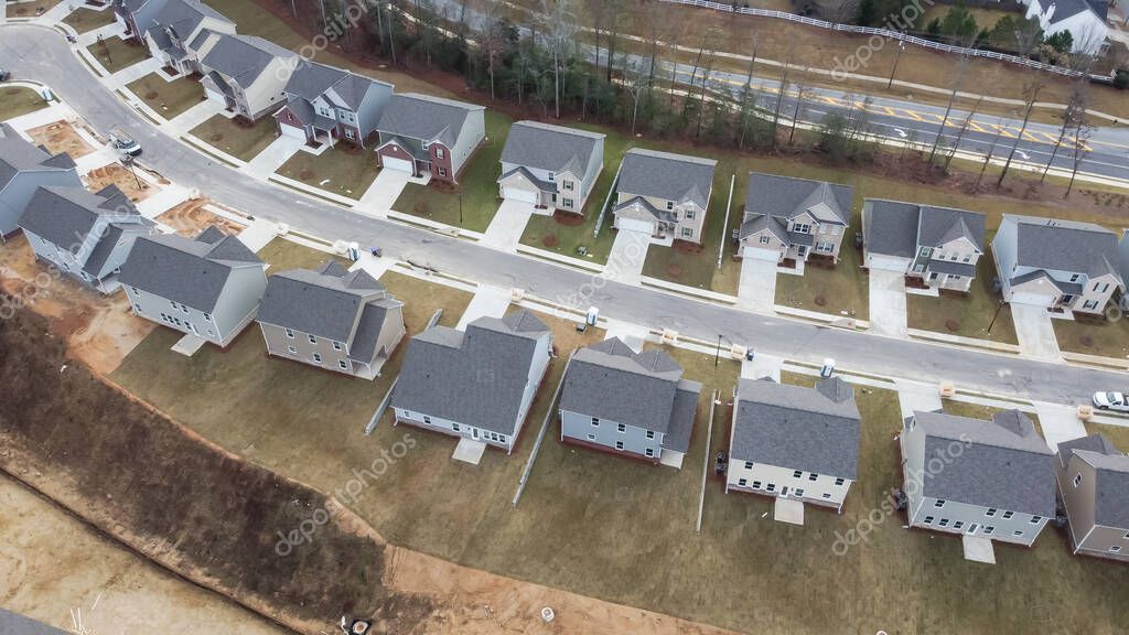 Aerial View Row Of Unfinished Two Story Single Family Homes Near aerial-view-row-of-unfinished-two-story-single-family-homes-near