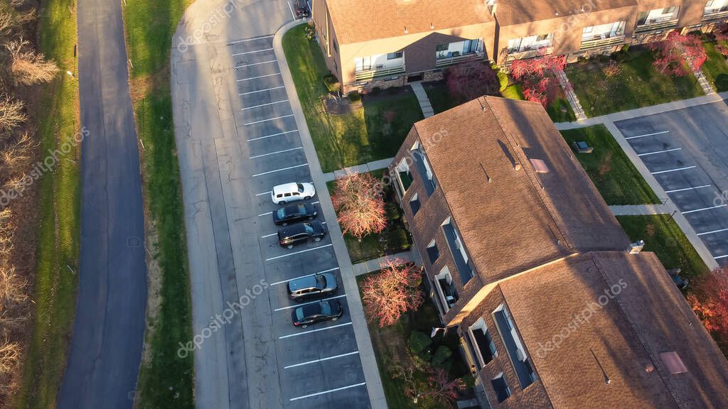 Aerial view three story barn style house apartment complex with outdoor