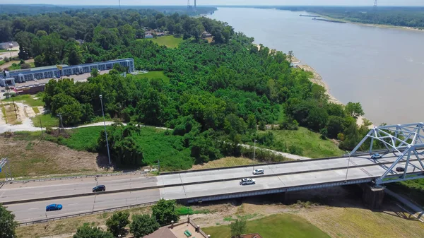 Entering Vicksburg Bridge from Mississippi, a cantilever bridge carrying Interstate 20 (I-20) and US Route 80 across the Mississippi River between Delta, Louisiana and Vicksburg. Aerial view freeway