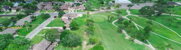 stock image Panorama aerial view community golf course in residential neighborhood along River Hill Drive in Calallen Park, Nueces County, Corpus Christi, suburban single family homes trees Southern Texas. USA