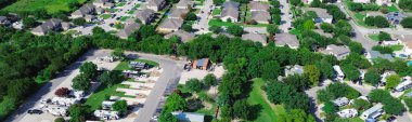 Panorama aerial residential neighborhood along Interstate I-35 Monarch Highway near full hookup RV site, colorful cottage retreat vacation rental in New Braunfels, concrete pads electric service. USA clipart