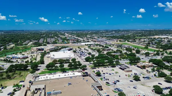 stock image Town center along Keller Parkway in Tarrant County, suburbs Dallas Fort Worth Metroplex, commercial buildings with packaged rooftop unit complete AC, strip mall, retail shop, restaurants, aerial. USA