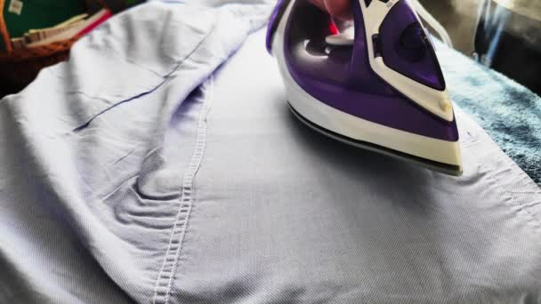 Top View Person Ironing Blue Shirt Clothes Home Doing Household — Stock Video