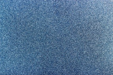 Gray plastic with white splashes, abstract texture. Macro.