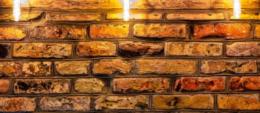 A brick wall, made of treated, antique-styled brick. High quality abstract background or texture.