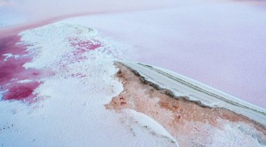 Top view of the salt-covered shore of Pink Lake. Drone view