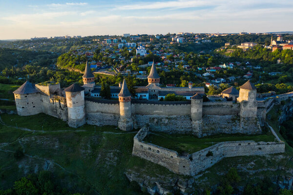 The old fortress in the city of Kamianets Podilskyi, Ukraine. Drone view. A wonderful morning landscape.