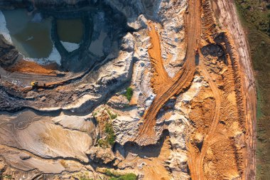 Excavation of soil in search of ores of non-ferrous metals. Scary look. Development of a new deposit.