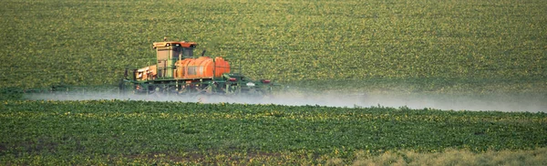 Enhancing Crop Health Observing Tractor Sprayer Action — Stock Photo, Image