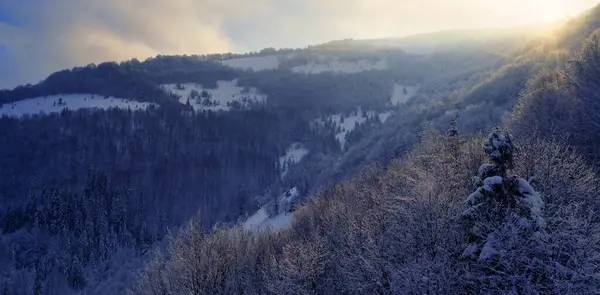 Snow-Kissed Horizons: Morning Splendor in the Mountainous Realm