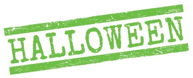 Yeşil grungy satır işareti üzerine yazılmış cadılar bayramı metni.