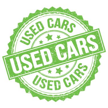 Yeşil yuvarlak damga işareti üzerine yazılmış Kullanılmış Otomobil metni
