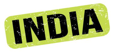 Yeşil-siyah grungy işareti üzerine yazılmış INDIA metni.