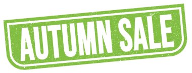 Yeşil grungy işareti üzerine yazılmış AUTUMN satış metni.