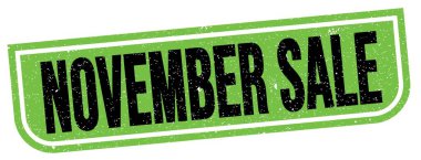Yeşil-siyah grungy işareti üzerine yazılmış Kasım Satışı metni.