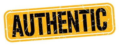 ATHENTIC metin turuncu-siyah grungy işareti üzerine yazılmış.