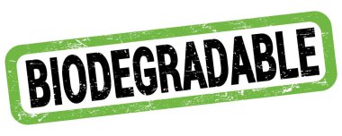 Yeşil-siyah dikdörtgen işareti üzerine yazılmış BIODEGRADable metni.