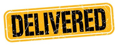 DELIVERED metin turuncu-siyah grungy işareti üzerine yazılmış.