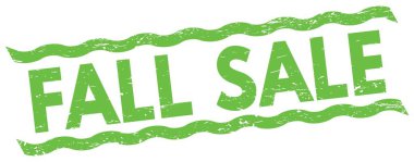 Yeşil çizgiler işareti üzerine yazılmış sonbahar satışı metni.