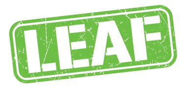 Yeşil grungy mühür işareti üzerine yazılmış yaprak metni.