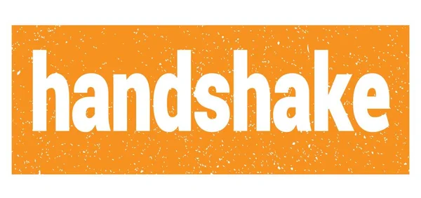 Handshake Text Auf Orangefarbenem Stempelschild — Stockfoto